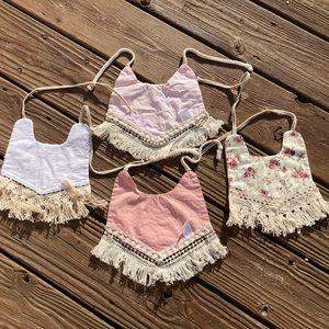Four (4) trendy boho baby girl bibs, reversible